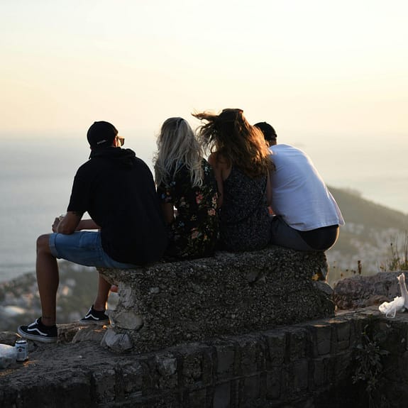 friends looking at beautiful view how to make friends as an adult